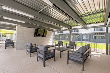 Al fresco kitchen with grilling stations and lounge seating
